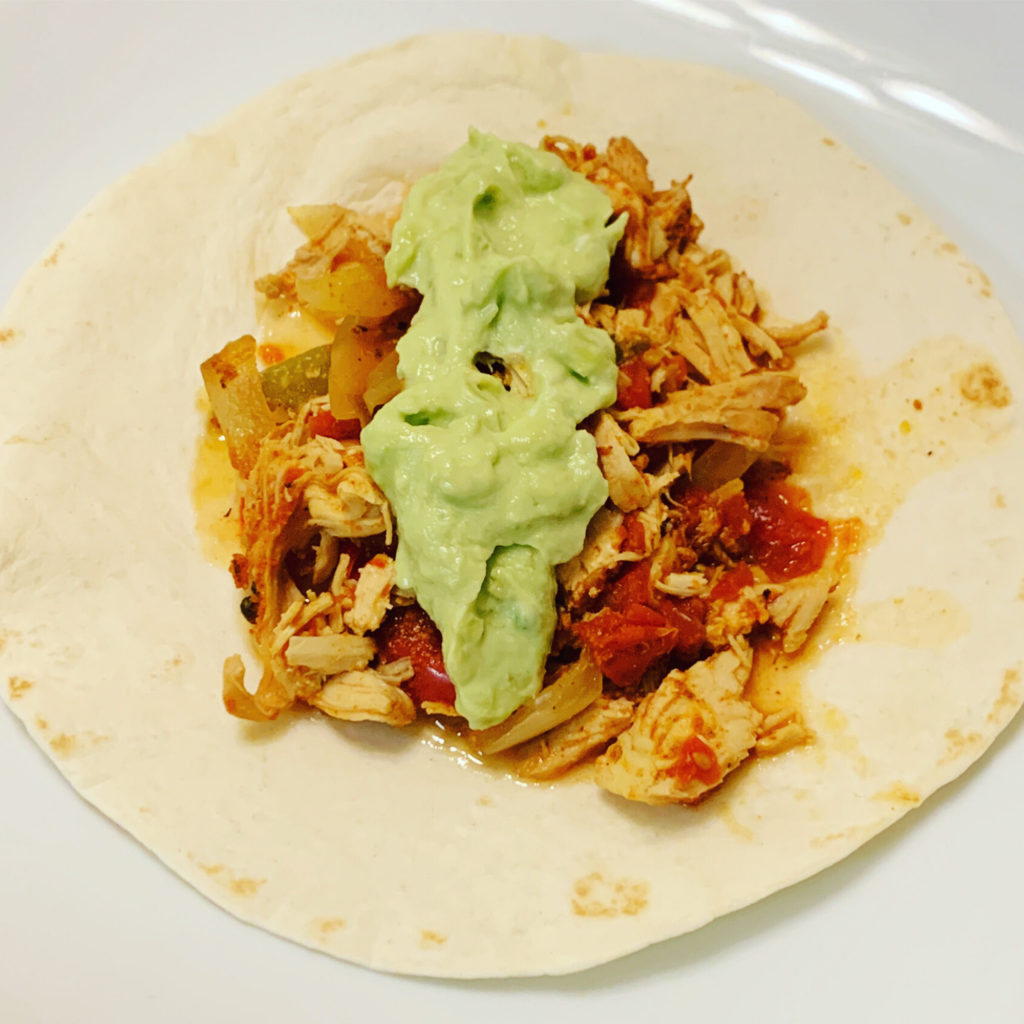 Slow Cooker Shredded Chicken Tacos With Avocado Lime Crema